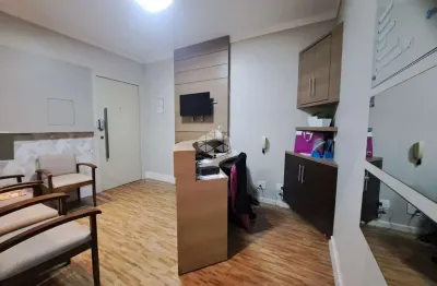 Sala comercial de 54,33 m² no centro com 1 vaga livre e estrutura odontológica completa à venda