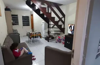 Sobrado de 2 quartos uma vaga de garagem com entrada coletiva de 71m , churrasqueira coletiva no pátio no bairro cidade nova