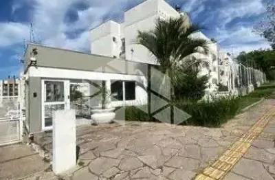 Apartamento térreo com 60 m², 2 dormitórios, churrasqueira e 1 vaga na cavalhada