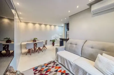Apartamento 2 dormitórios, churrasqueira, varanda, vista panorâmica, piso porcelanato, 75m², 1 vaga, bairro vila nova em novo hamburgo.