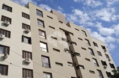 Amplo apartamento de 2 dormitórios com sacada, churrasqueira e lareira.