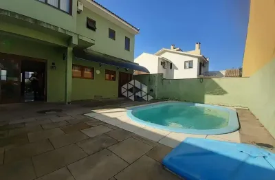 Casa com 3 quartos à venda na Rua Louro, 34, Hípica, Porto Alegre