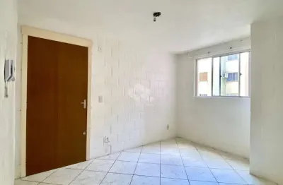 Apartamento a venda com 2 dormitórios, sala cozinha, banheiro , área de serviço e vaga de estacionamento rotativa