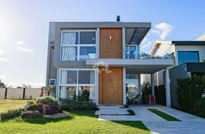 Casa com 4 dormitórios no condomínio península ponta da figueira