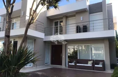 Sobrado de luxo no condomínio las dunas, xangri-lá - 4 suítes, piscina privativa e 350m² de sofisticação