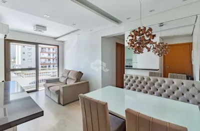 Apartamento de 2 dormitórios com suíte, sacada e churrasqueira, 1 vaga de garagem no bairro passo da areia