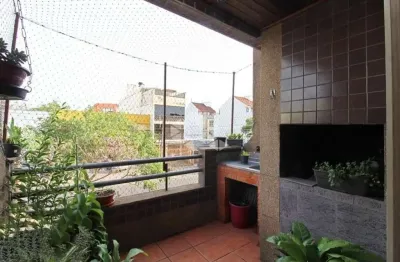 Apartamento com sacada e churrasqueira e vaga coberta a metros do zaffari borubon