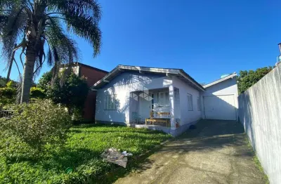 Casa 3 dormitórios com 1 suite e amplo terreno em campo bom