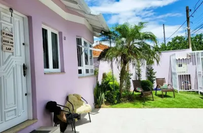 Casa a venda no bairro igara com 2 dormitórios , 1 suíte, espaço gourmet e pátio com piscina