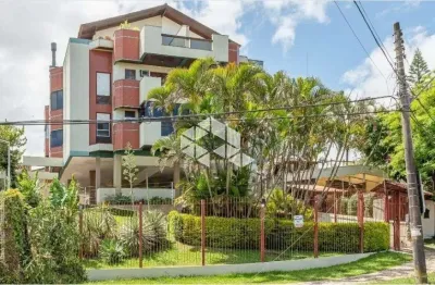2 dormitórios sacada com churrasqueira 73,35 m2 area priv 1 garagem vista guaiba