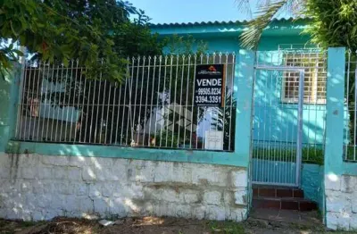 Casa térrea 4 quartos, pátio, edícula e churrasqueira para venda no bairro nonoai