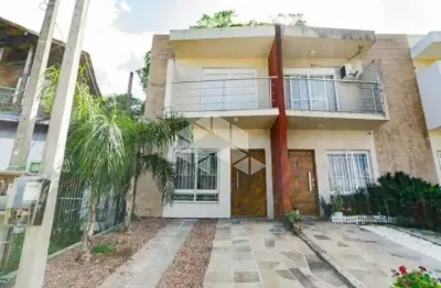 Casa com 3 quartos à venda na Avenida Vereador Roberto Landell de Moura, 326, Campo Novo, Porto Alegre