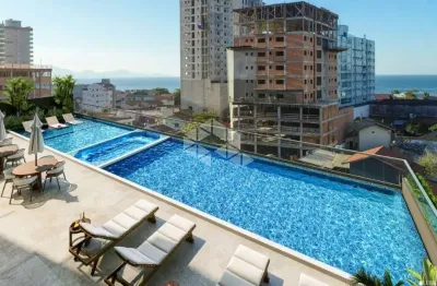 Apartamento com 2 suítes e 2 vagas perto do mar em porto belo