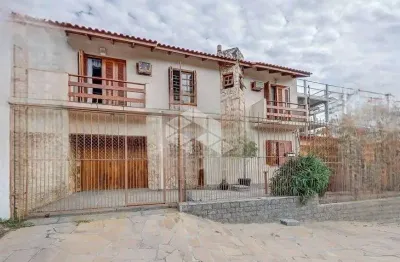 Casa estilo sobrado 4 dormitórios suíte closet sacada no bairro cavalhada zona sul de poa/rs.