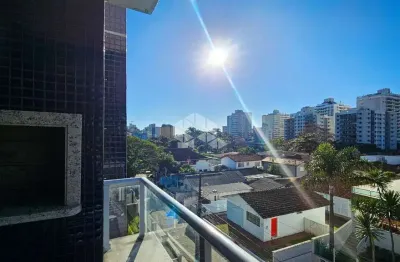 Apartamento 2 quartos sendo 1 suíte duas vagas e sacada com churrasqueira no itacorubi florianópolis