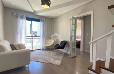 Apartamento duplex mobiliado com 03 dormitórios sendo 1 suíte e 02 box individuais no bairro exposição em caxias do sul