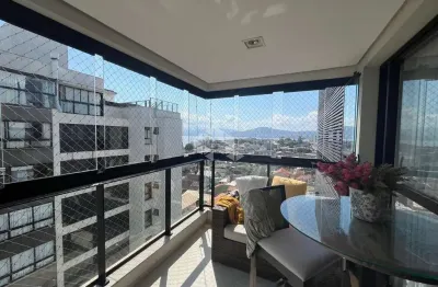 Apartamento semimobiliado com vista para o mar com 2 quartos sendo 1 suíte e 2 vagas de garagem no balneário em florianópolis/sc