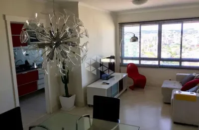 Apartamento semimobiliado em andar alto no rio branco em porto alegre
