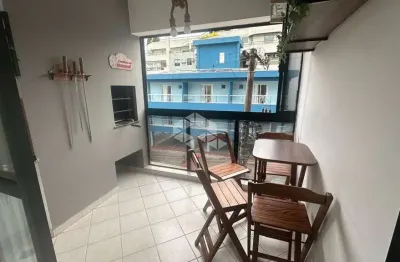 Apartamento tres dormitórios sendo uma suíte em bombas- bombinhas- sc