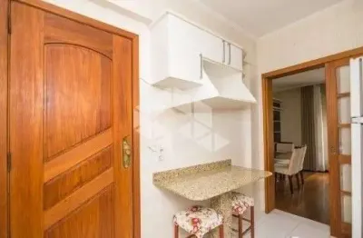 Apartamento semi mobiliado com elevador e garagem no jardim botânico