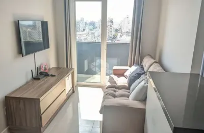 Apartamento de 2 quartos com churrasqueira e 1 vaga de garagem no centro de canoas.