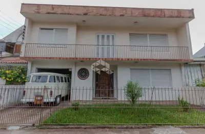 Casa com 4 quartos à venda na Rua Doutor Jorge Fayet, 672, Chácara das Pedras, Porto Alegre