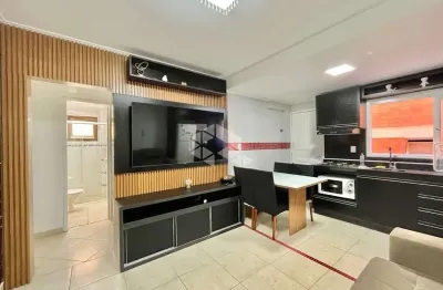 Apartamento 2 dormitórios mobiliado com vaga de garagem no centro de capão da canoa