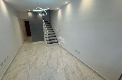 Sobrado novo a venda no bairro real, praia grande, com 3 quartos, 1 suite e 1 vaga independente