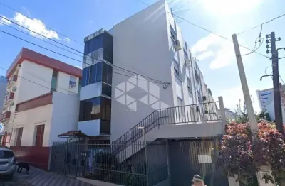 Apartamento com dois quartos e vaga de garagem à venda no centro em santa maria