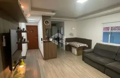 Apartamento semi-mobiliado à venda no pagani - palhoça/sc com 2 dormitórios, suíte e sacada com churrasqueira