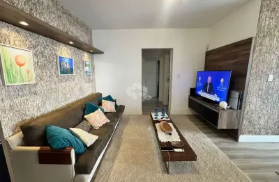 Apartamento semimobiliado com 2 quartos e sacada no canto em florianópolis pronto para morar