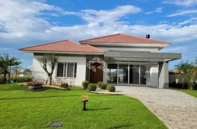 Casa à venda, com 5 dormitórios, 2 vagas/box, no condomínio green village, xangri-lá/rs