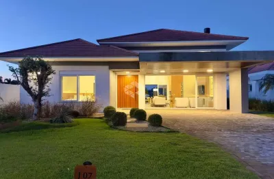 Condomínio green village,casa com 290 m² ,lote com 1000 m² ,05 suítes ,living 3 ambientes lareira ,lavabo