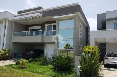 Sobrado com 4 suítes (dormitórios), 02 vagas/box, condomínio Capão Ilhas Resort