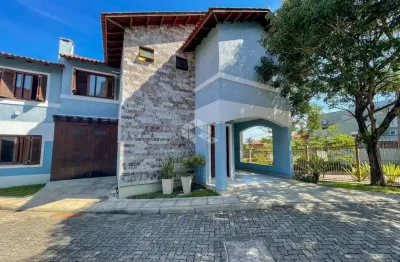 Casa em condomínio fechado com 3 quartos à venda na Rua Upamaroti, 100, Cristal, Porto Alegre