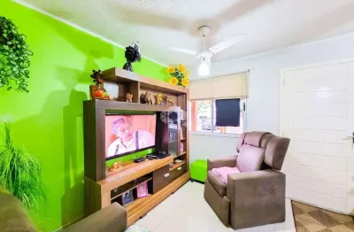 Sobrado em condomínio 108m² 03 dormitórios 02 vagas cobertas no Bairro Igara, em Canoas