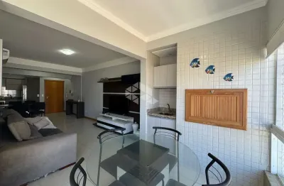 Apartamento de 2 dormitórios mobiliado com sacada, churrasqueira e box/vaga de garagem no bairro Navegantes em Capão da Canoa