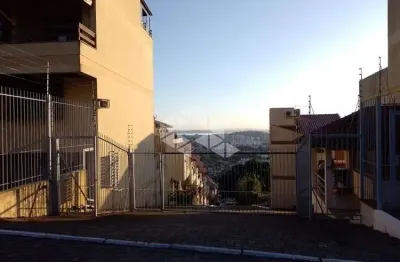 Terreno em condomínio fechado à venda na Rua Alcebíades Antônio dos Santos, 635, Nonoai, Porto Alegre