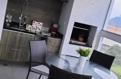 Amplo apartamento na ponta da praia - 2 suítes - sacada com churrasqueira e lazer