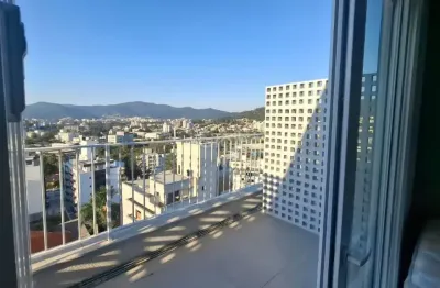 Cobertura studio moderna com dormitório e sacada no bairro carvoeira em florianópolis