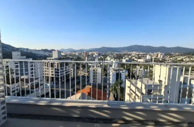 Cobertura studio moderna com dormitório e sacada no bairro carvoeira em florianópolis