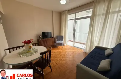 Praia do gonzaga em santos. sacada vista mar, 2 quartos, sala, cozinha, 2 banheiros, área de serviço e despensa, prédio com elevador.