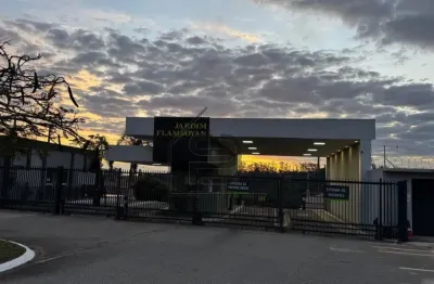 Terreno à venda condomínio flamboyan, 600m², plano, meio de rua, com projeto aprovado, bragança paulista.