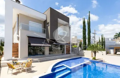 Casa a venda com 4 suítes e piscina no condominio biel no swiss park - façanha imóveis campinas