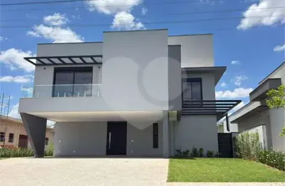 Casa  à venda com 4 quartos, sendo 4 suítes,  no condomínio portal dos bandeirantes, salto - sp