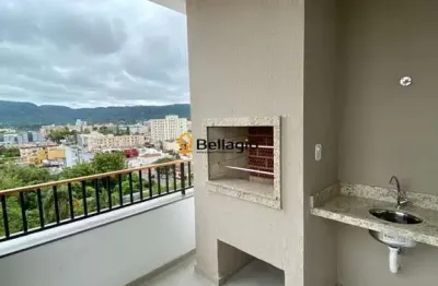 Apartamento de 2 dormitórios, sendo 1 suíte, semimobiliado, sacada, churrasqueir