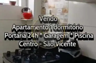 Apartamento de 1 dorm no centro de sv com elevador, andar alto. prédio com piscina