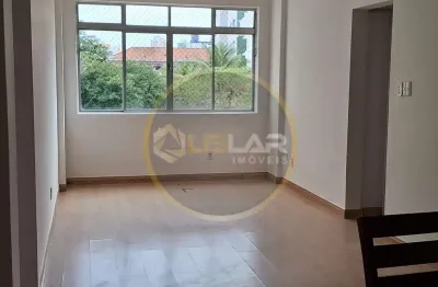 Apartamento de 2 dormitórios com sala para 2 ambientes e garagem