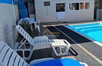 À venda i0255 - casa 3 dormitórios em massaguaçu - caraguatatuba/sp