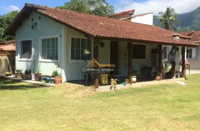 À venda i0581 - casa com edícula 3 dormitórios no massaguaçu - caraguatatuba/sp